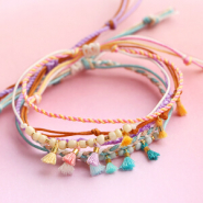 Set de inspiraciones Así puedes incorporar las borlas mini a tu colección de joyería