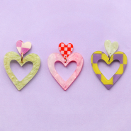 Set de inspiraciones Mezcla & Combina Colgantes de resina y colgantes de Acero Inox corazón