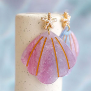 Set de inspiraciones Joyas con aire marino con colgantes de resina y en acero inox