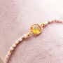 Elegantes pendientes y pulseras con los abalorios faceteados cubo