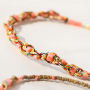 Elegantes pendientes y pulseras con los abalorios faceteados cubo
