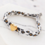 Crea divertidas pulseras y coleteros para pelo con la cinta el&aacute;stica cosida leopardo: