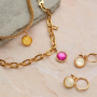Pulseras y pendientes coordinados con cabuchones