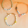 Crea joyas personalizadas con abalorios letras en cer&aacute;mica