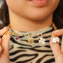 Dise&ntilde;a joyas &uacute;nicas con dijes de acero inoxidable con n&uacute;meros de &aacute;ngeles