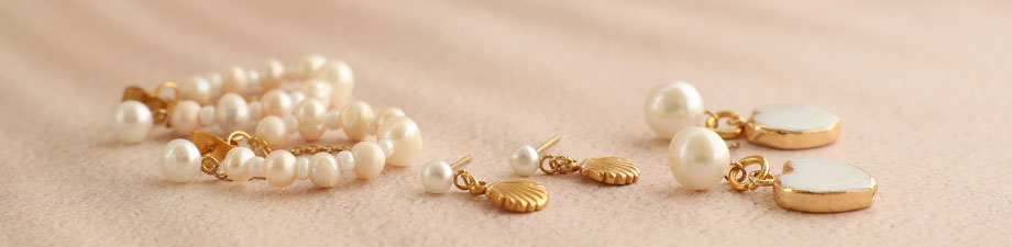 &iexcl;Novedad! Pendientes de acero inoxidable perla con ojal